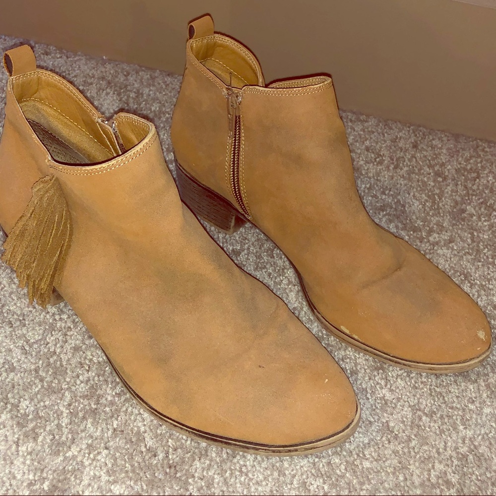 Brown sued fringe booties